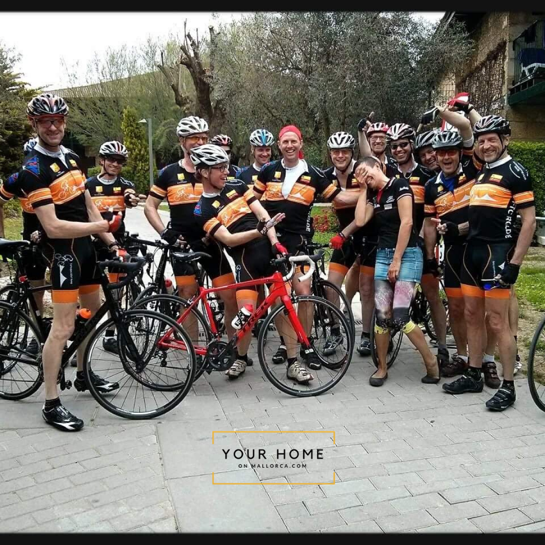 group of cyclists laughing